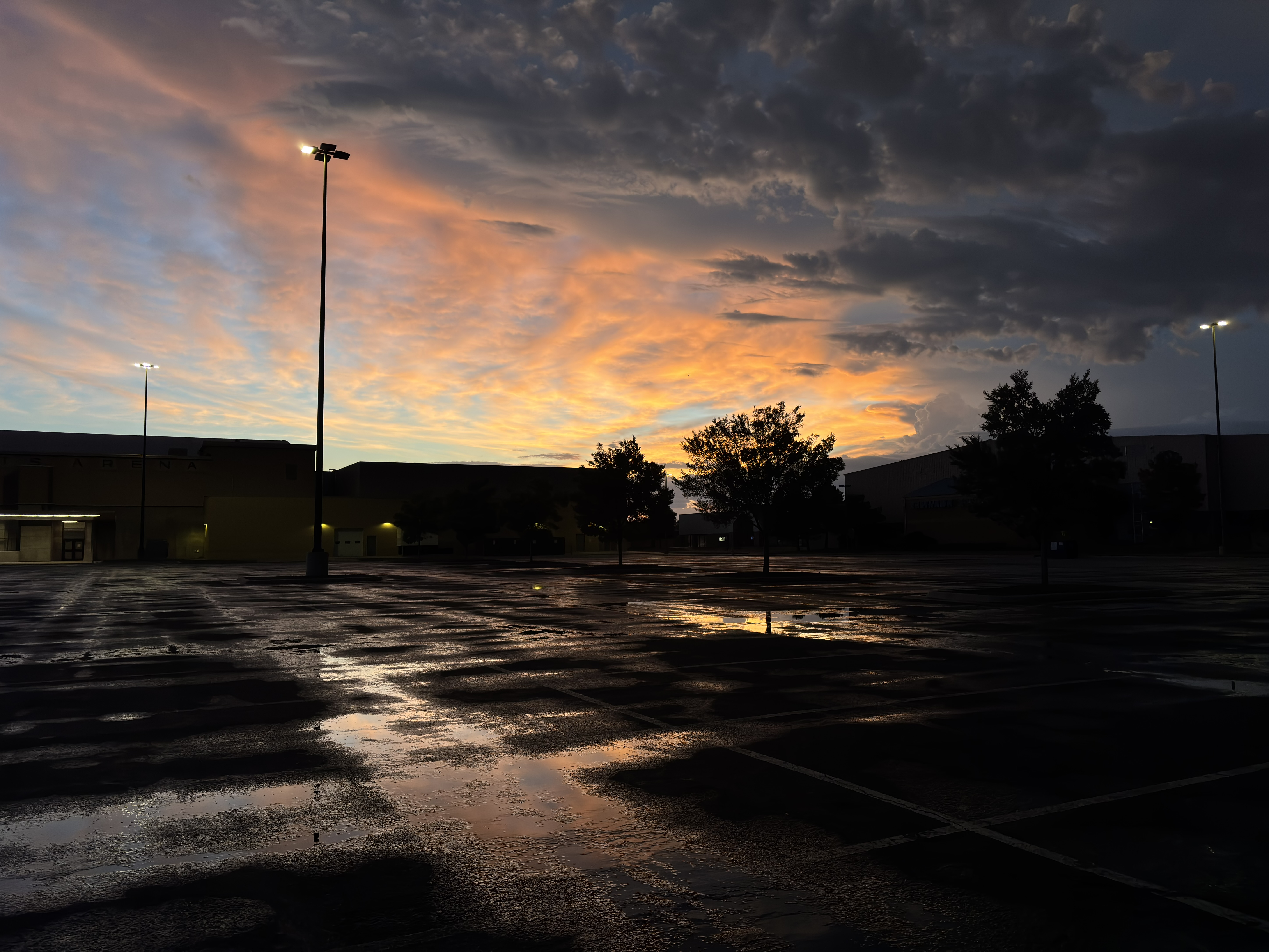photo of a parking lot during sunset, not a lot i can say about this one actually.